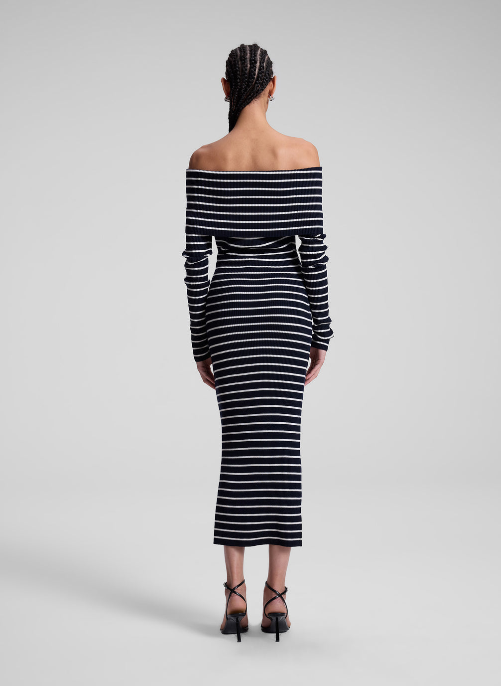 woman wearing navy blue and white striped off shoulder dress