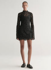 woman wearing black lace mini dress
