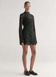 woman wearing black lace mini dress