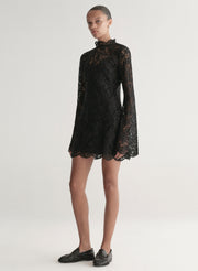 woman wearing black lace mini dress