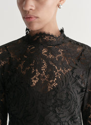 woman wearing black lace mini dress