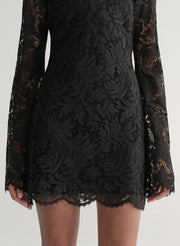 woman wearing black lace mini dress