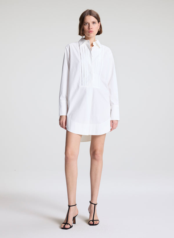 woman wearing white shirtdress