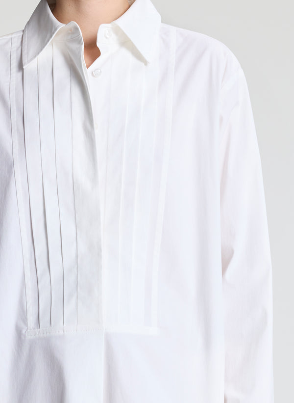 woman wearing white shirtdress