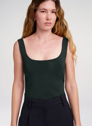 woman wearing green tank top