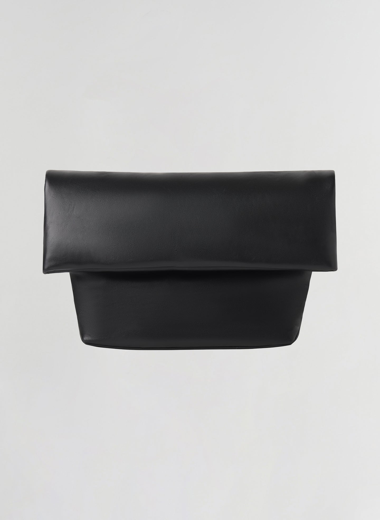 A black leather clutch bag with a wide top flap and a structured rectangular body, shown against a plain light gray background.