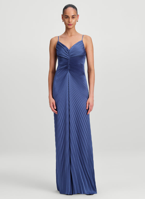 woman wearing blue pleated gown