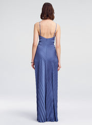 woman wearing blue pleated gown