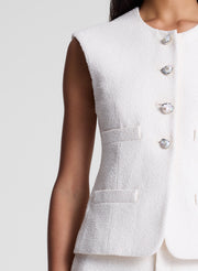 woman wearing white vest and matching short