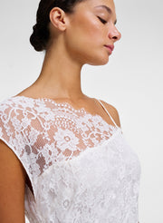 detail of cream lace gown