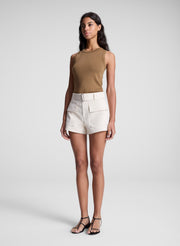 woman wearing brown tank top and beige shorts