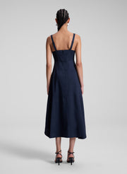 woman wearing navy blue midi dress