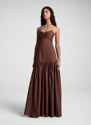woman wearing brown maxi dress