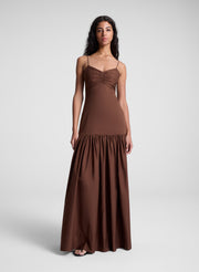 woman wearing brown maxi dress