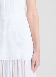 woman wearing white top and matching maxi skirt