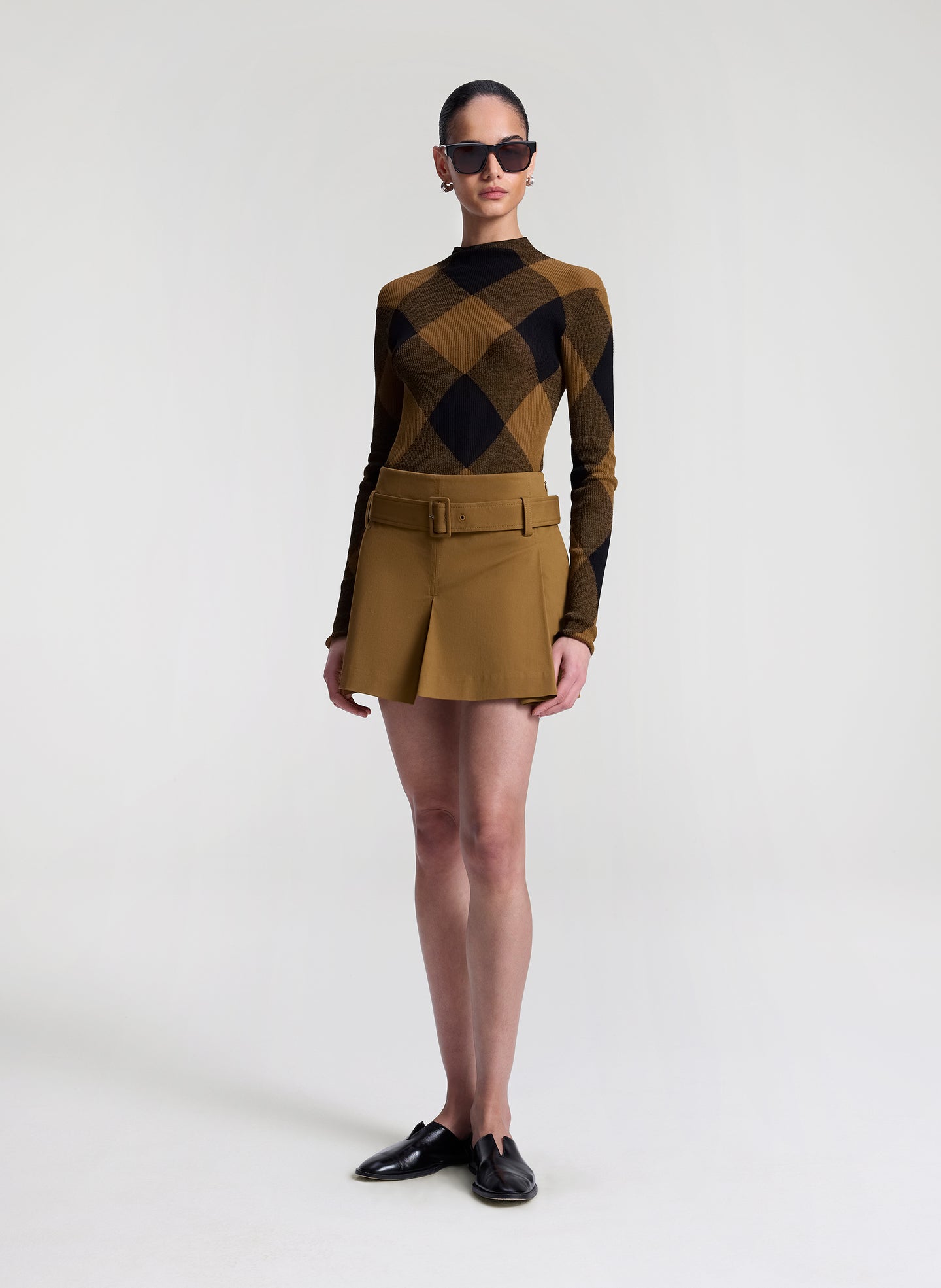 woman wearing plaid print fine gauge voile knit top