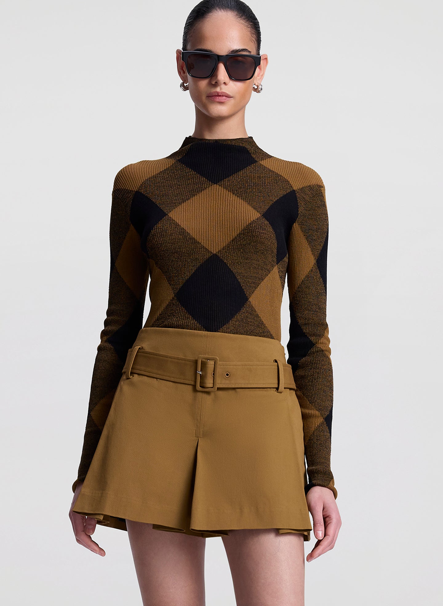 woman wearing plaid print fine gauge voile knit top