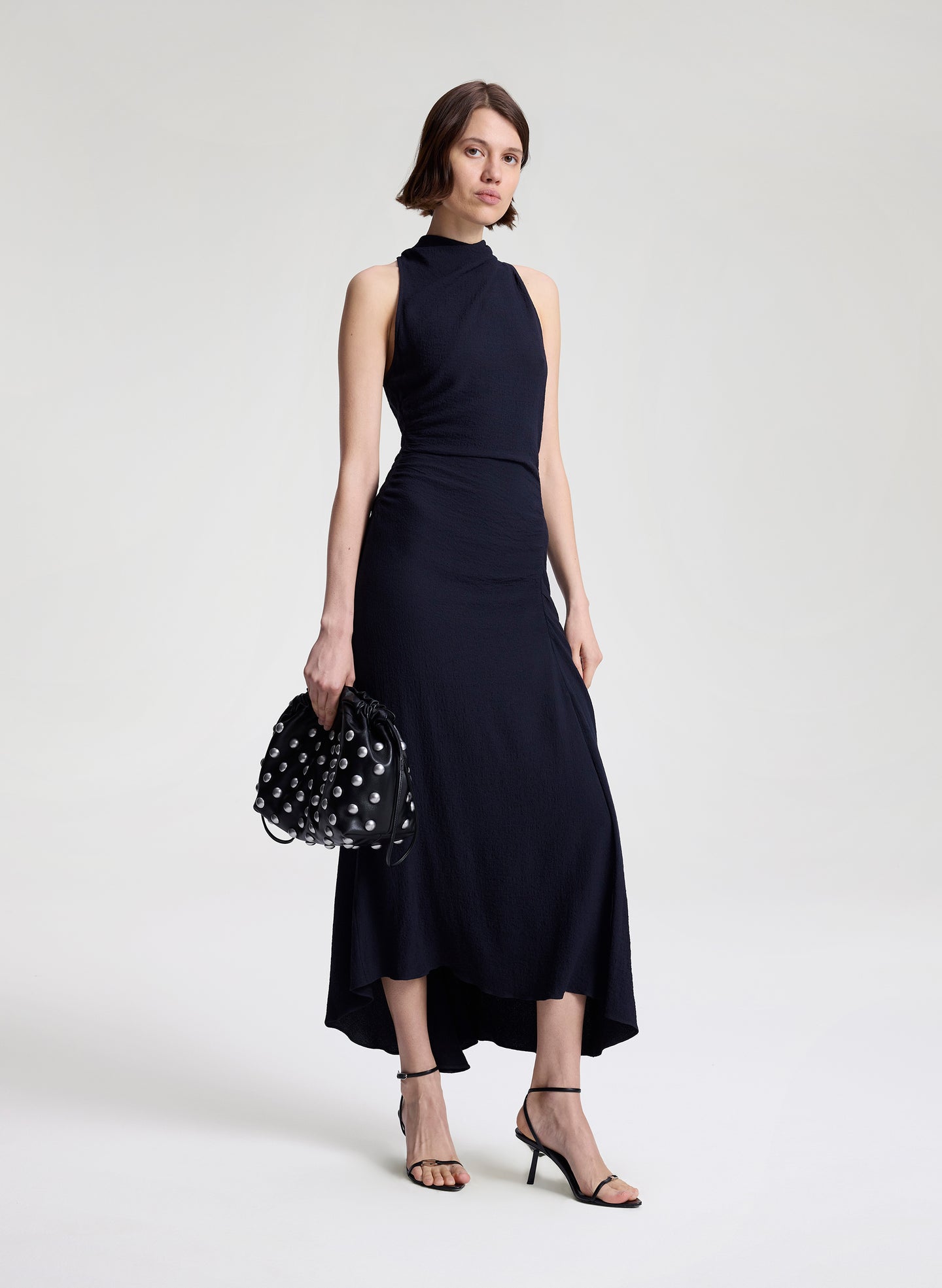 woman wearing dark blue midi dress