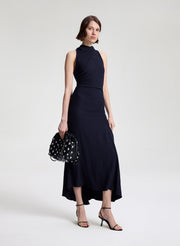 woman wearing dark blue midi dress