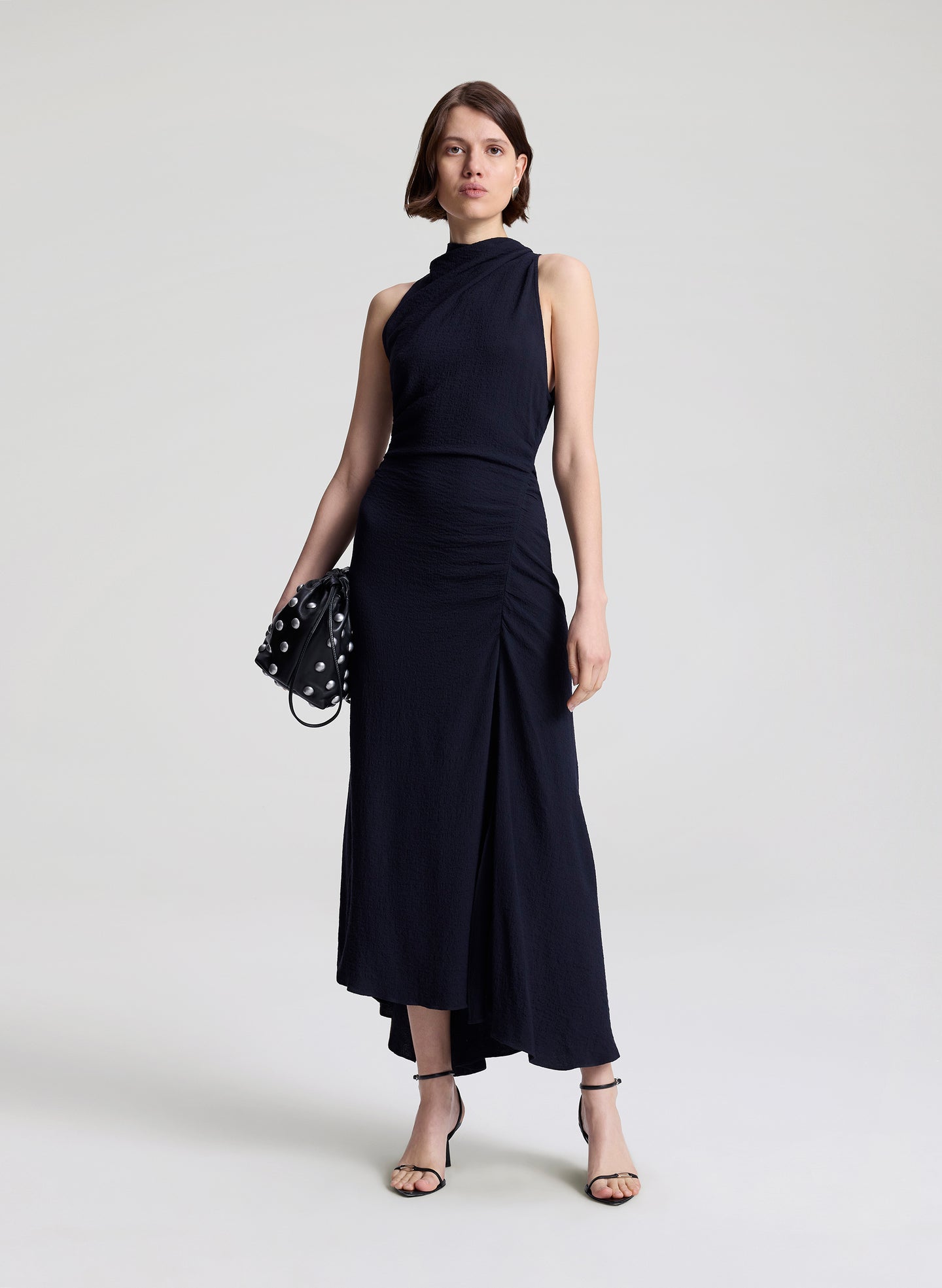 woman wearing dark blue midi dress