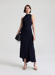 woman wearing dark blue midi dress