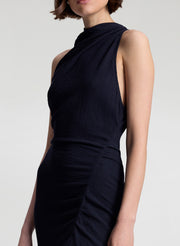 woman wearing dark blue midi dress