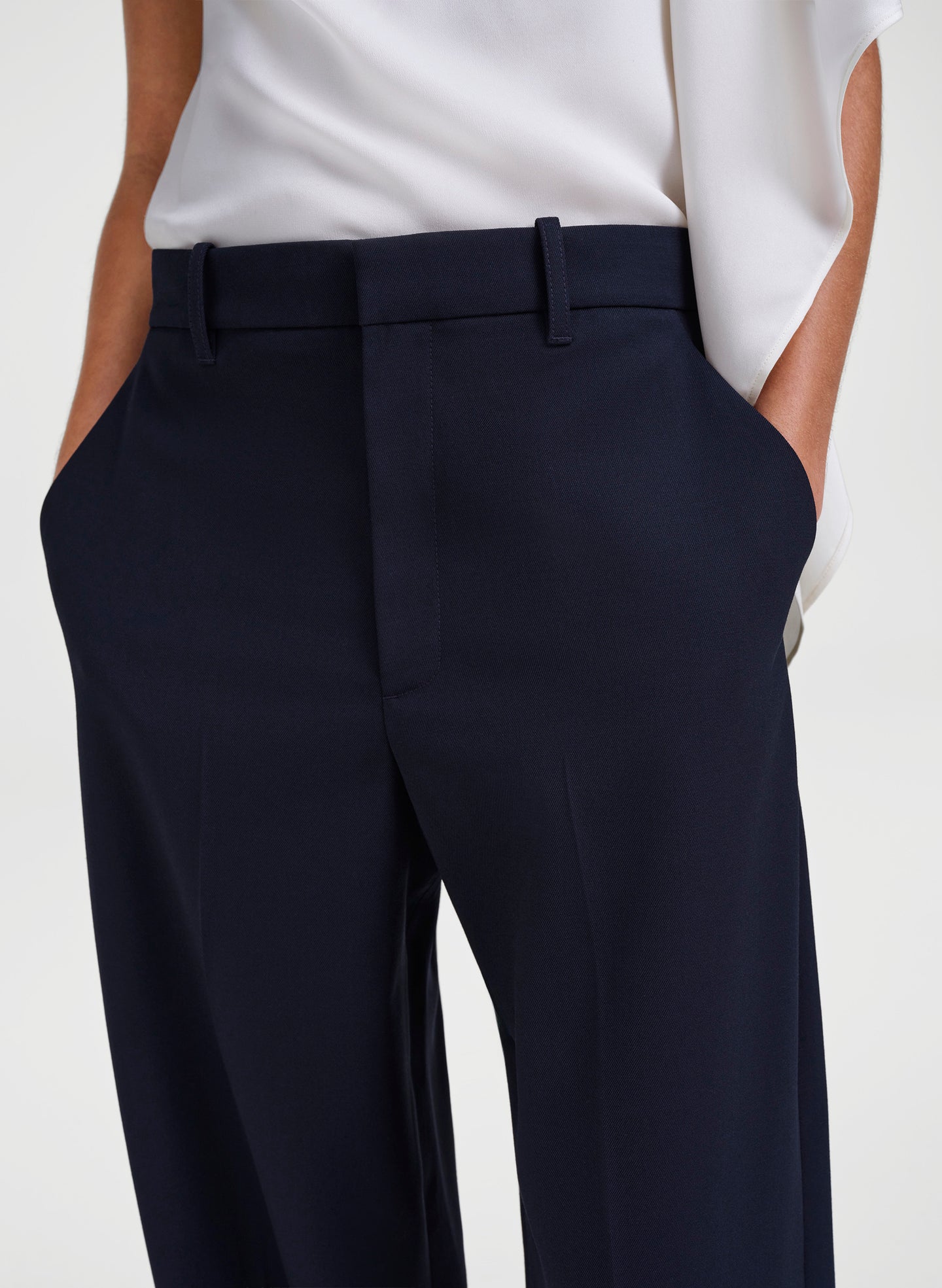 woman in blue pants