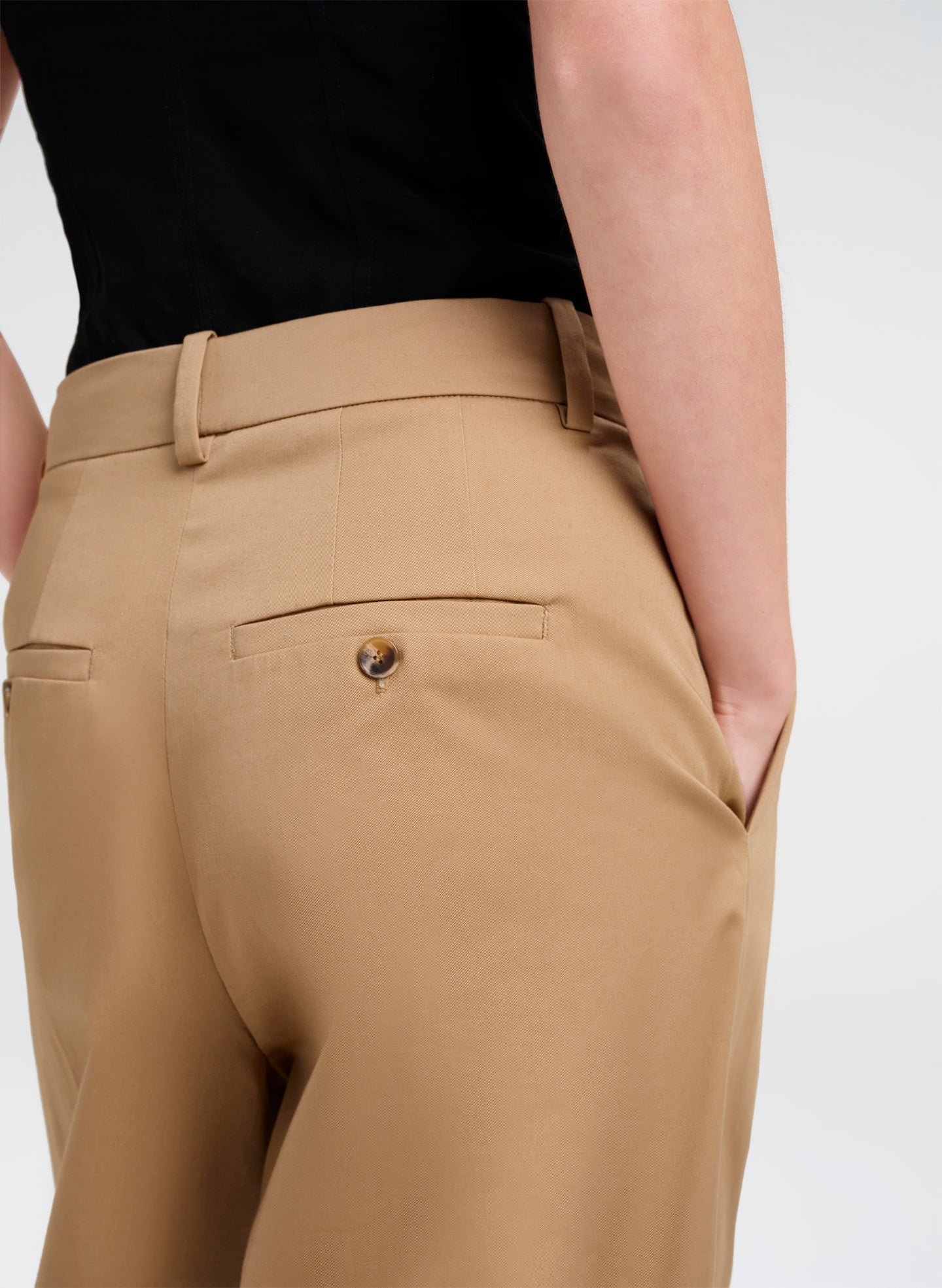 tan pants worn by woman
