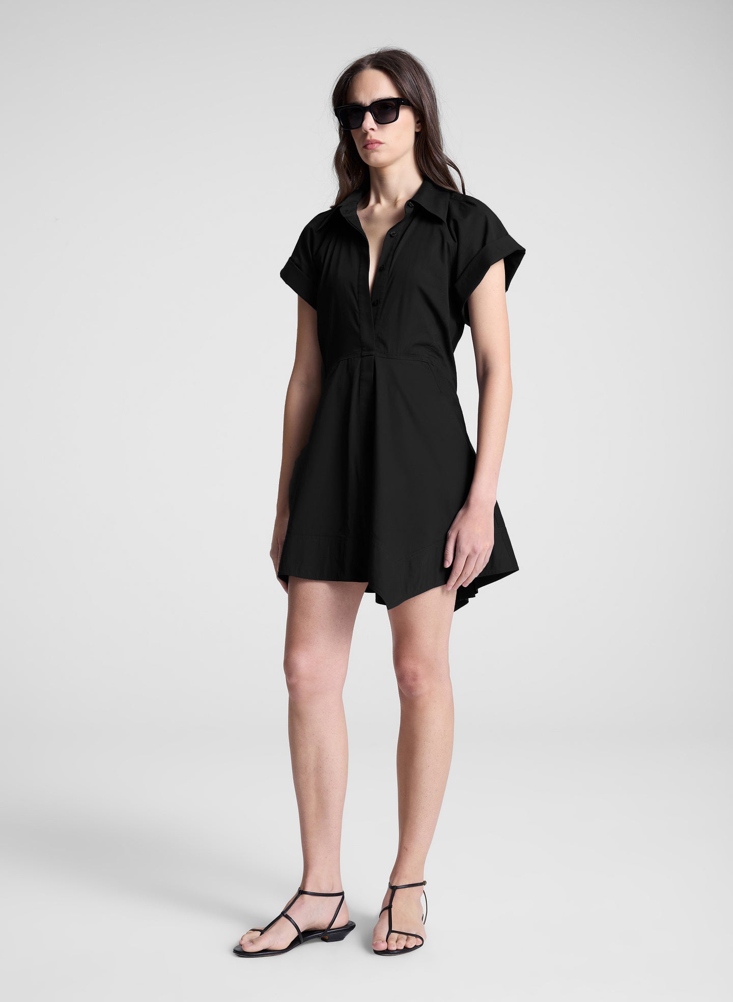 woman wearing black mini shirt dress