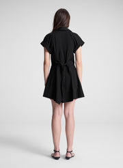 woman wearing black mini shirt dress