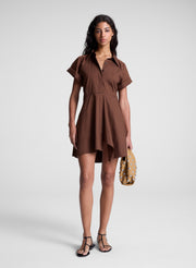woman wearing brown mini shirt dress