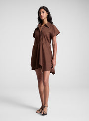 woman wearing brown mini shirt dress