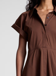 woman wearing brown mini shirt dress