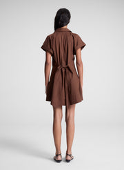 woman wearing brown mini shirt dress