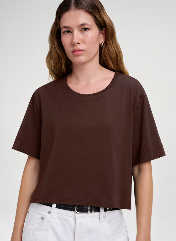 woman wearing brown crop tee shirt