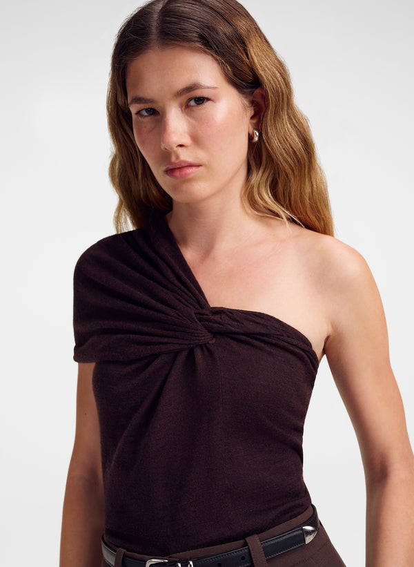 woman wearing brown one shoulder merino top