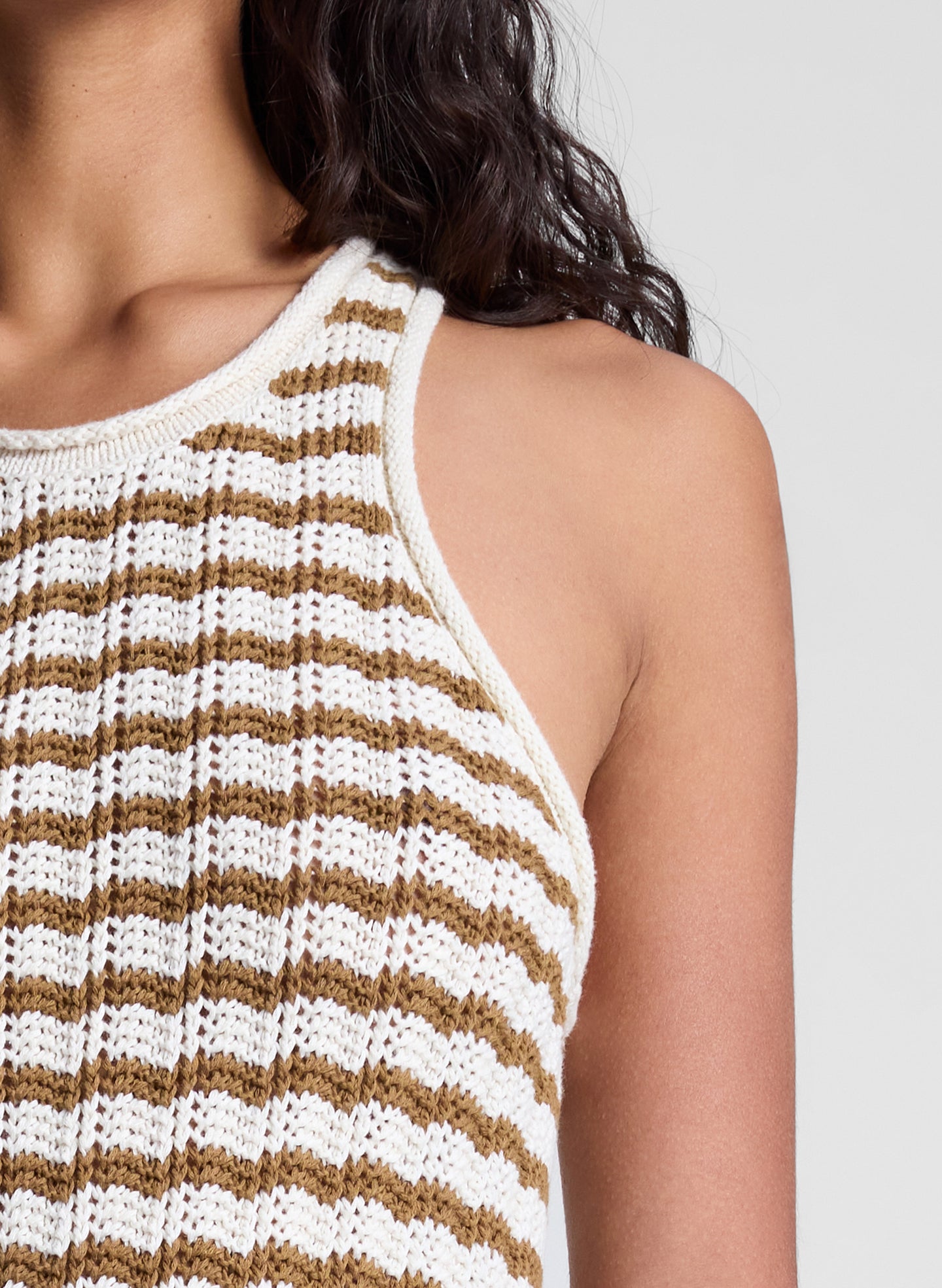 woman wearing striped knit mini dress