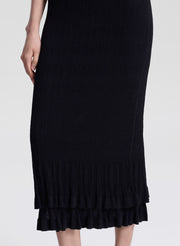 woman wearing black fine gauge voile knit midi dress