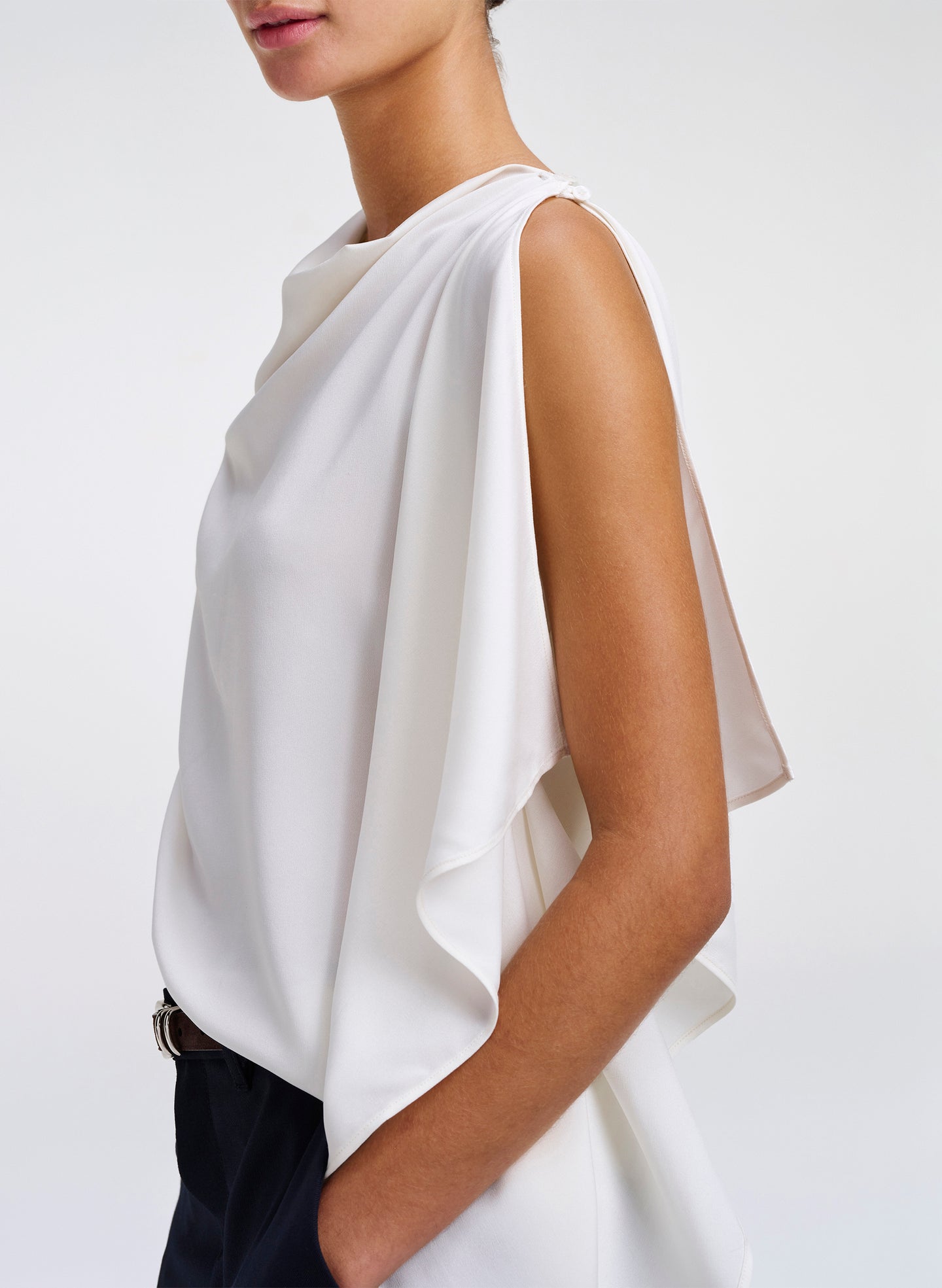 woman wearing white sleeveless top