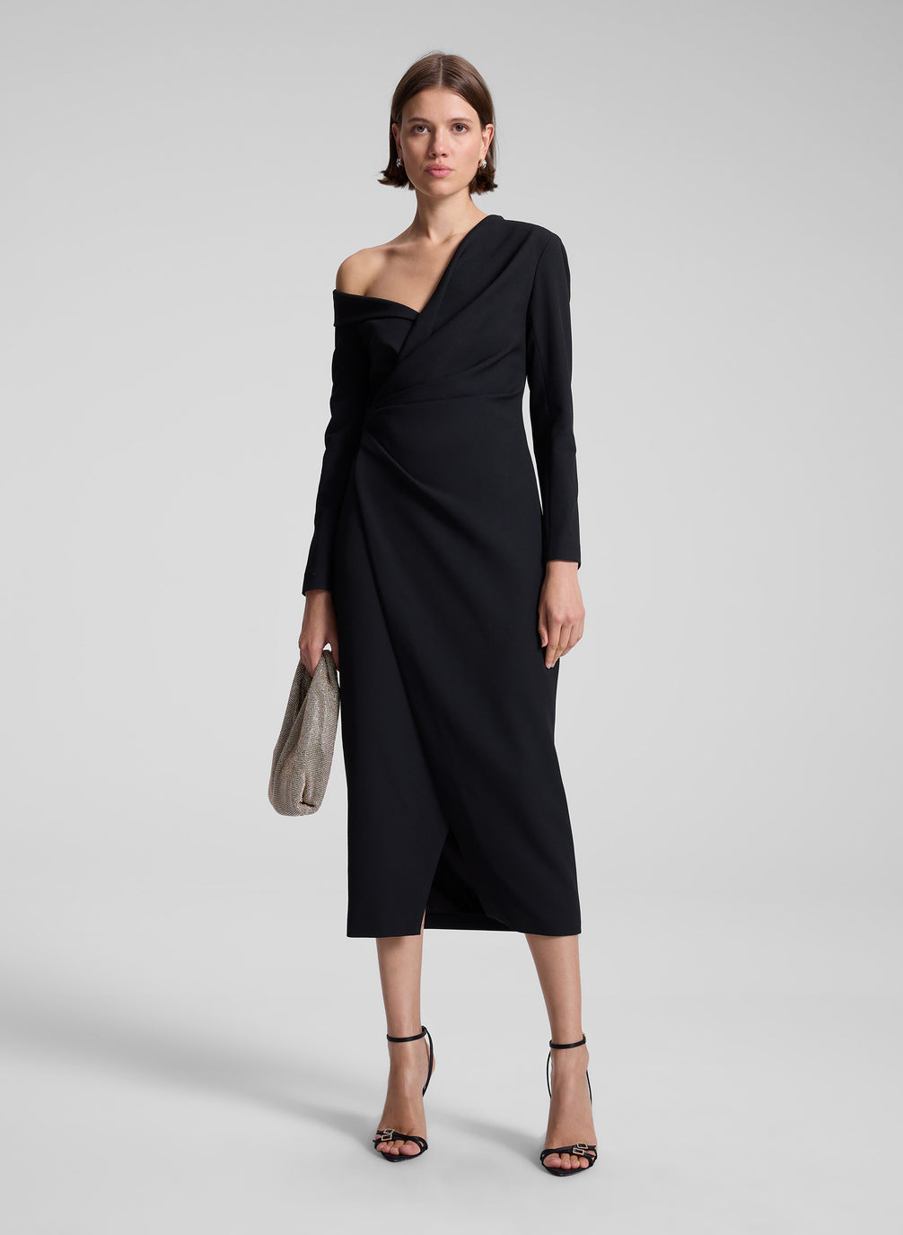 woman wearing black midi dress