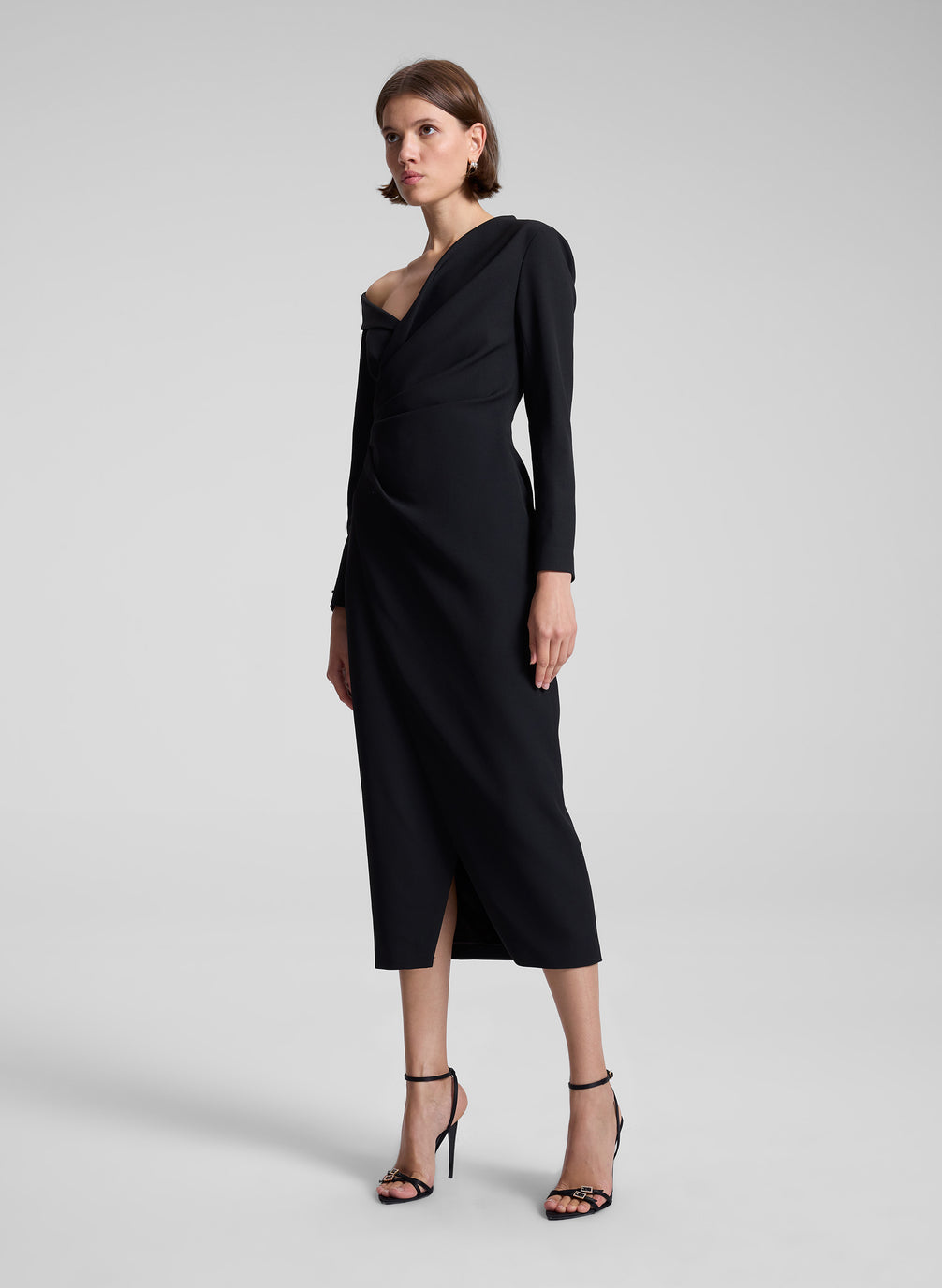 woman wearing black midi dress