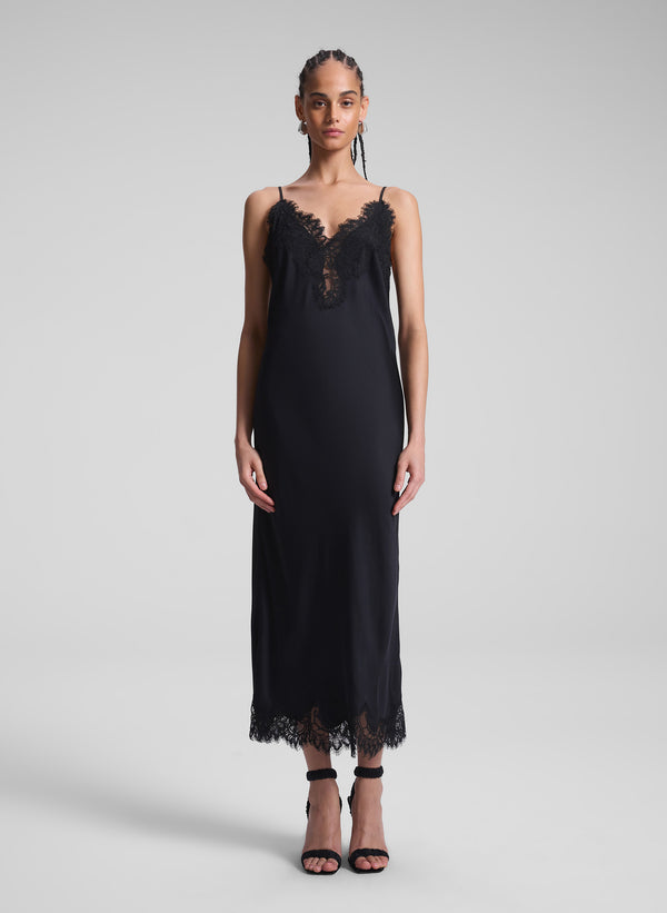 woman wearing black slip dress 