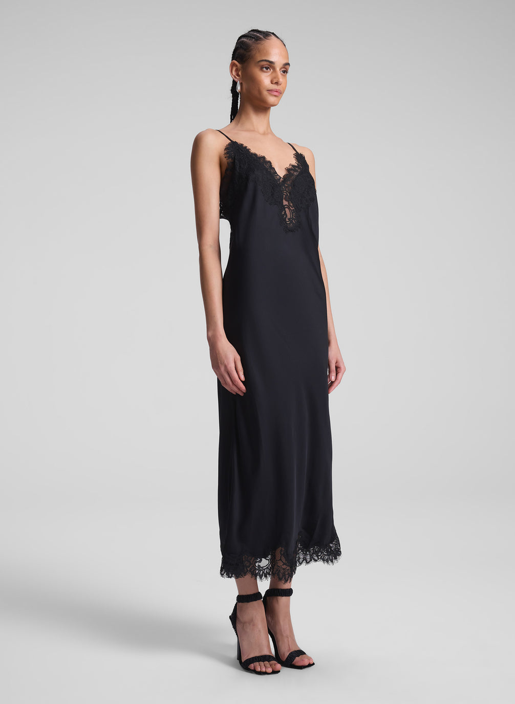 woman wearing black slip dress 