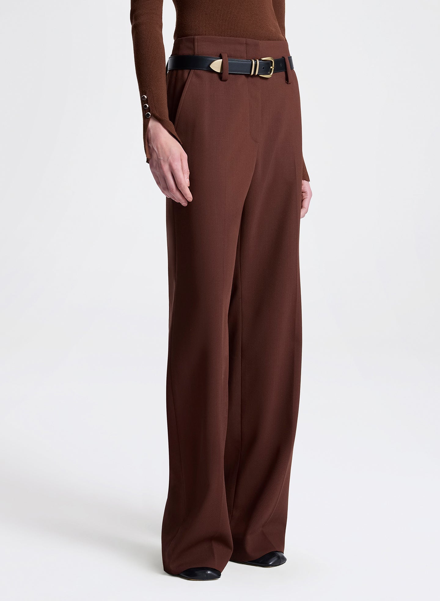 Brown wide-leg pants with a belt on a white background