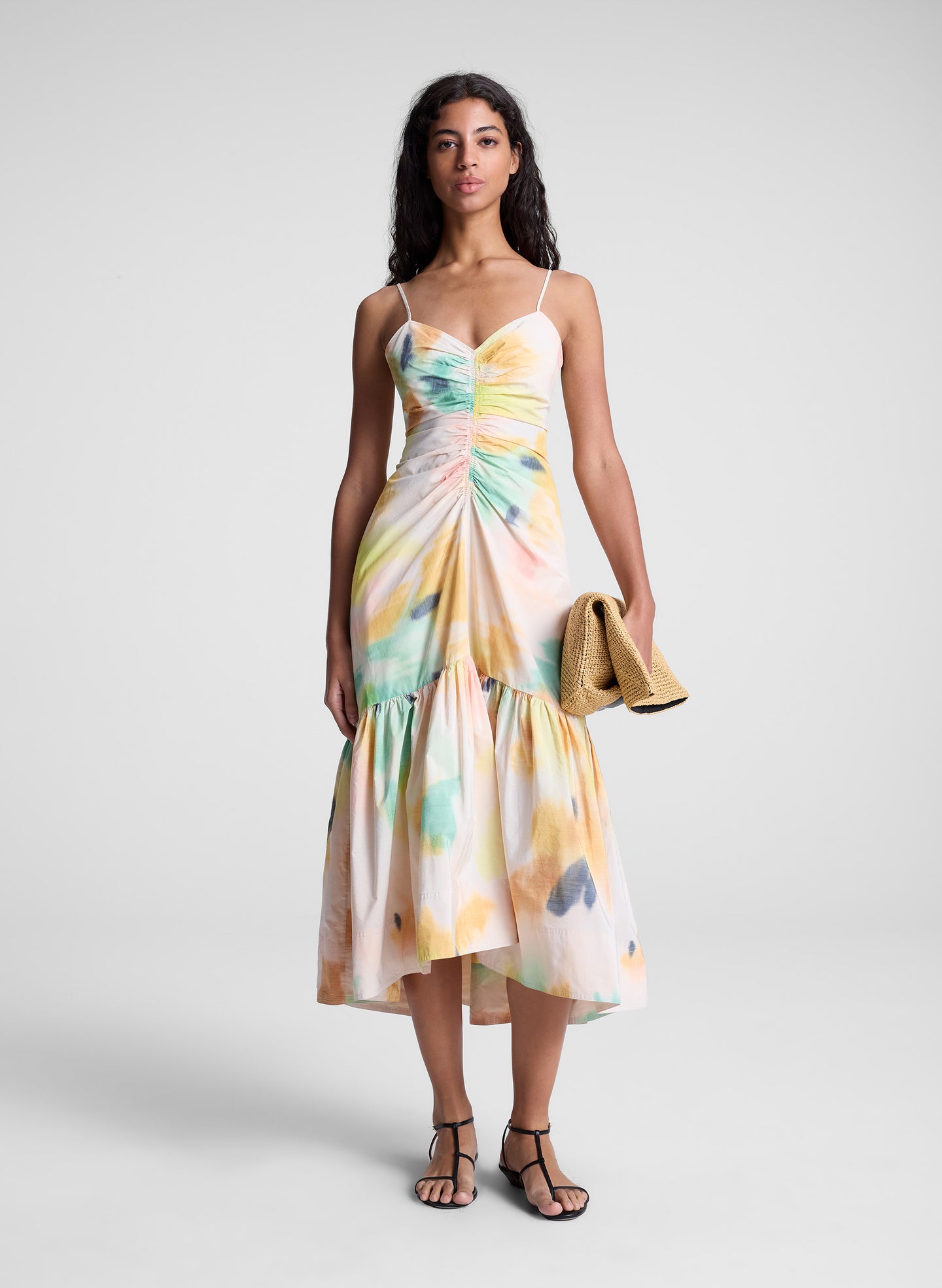 woman wearing multicolor sleeveless midi dress