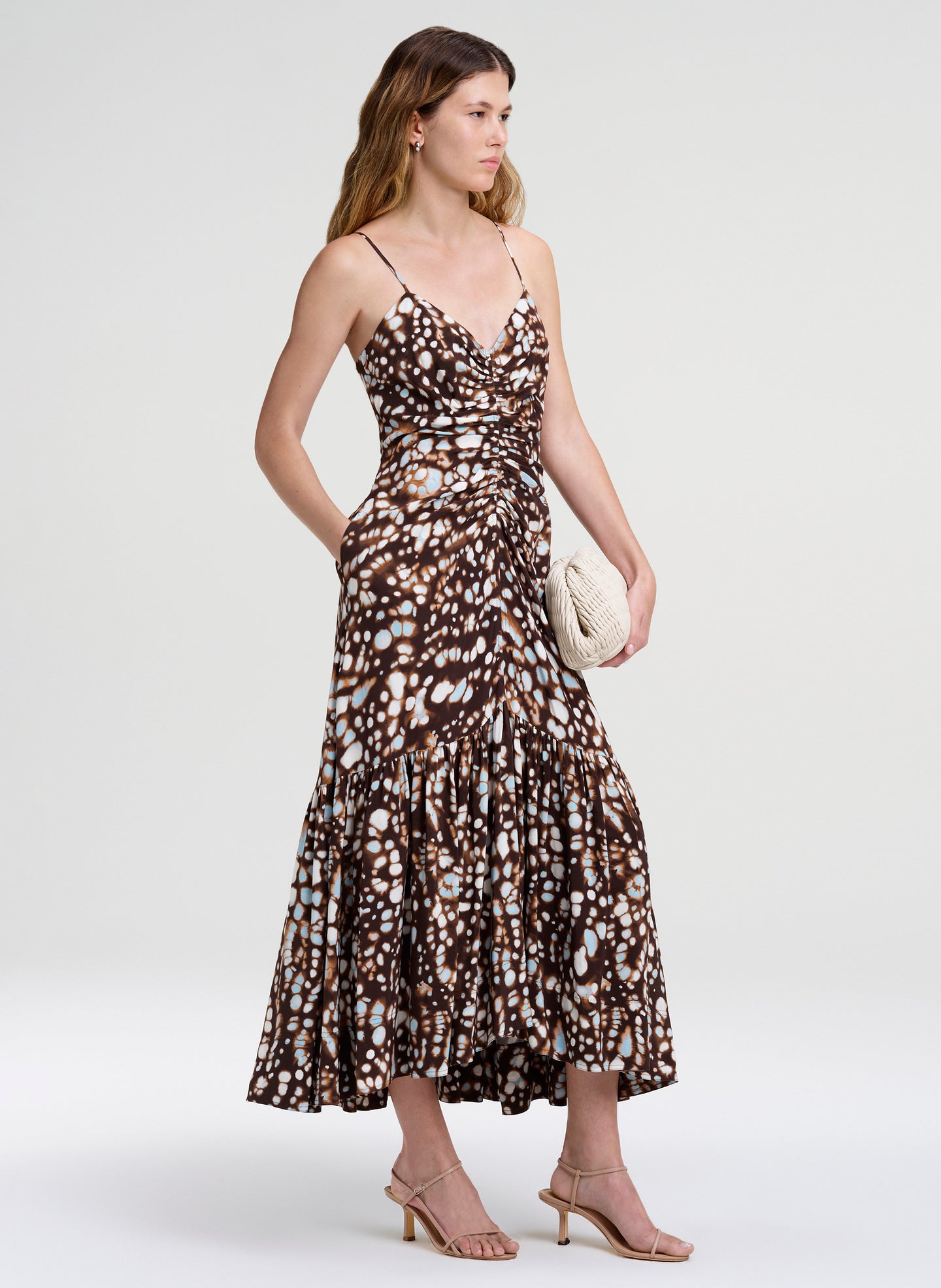 woman  wearing brown print midi dress
