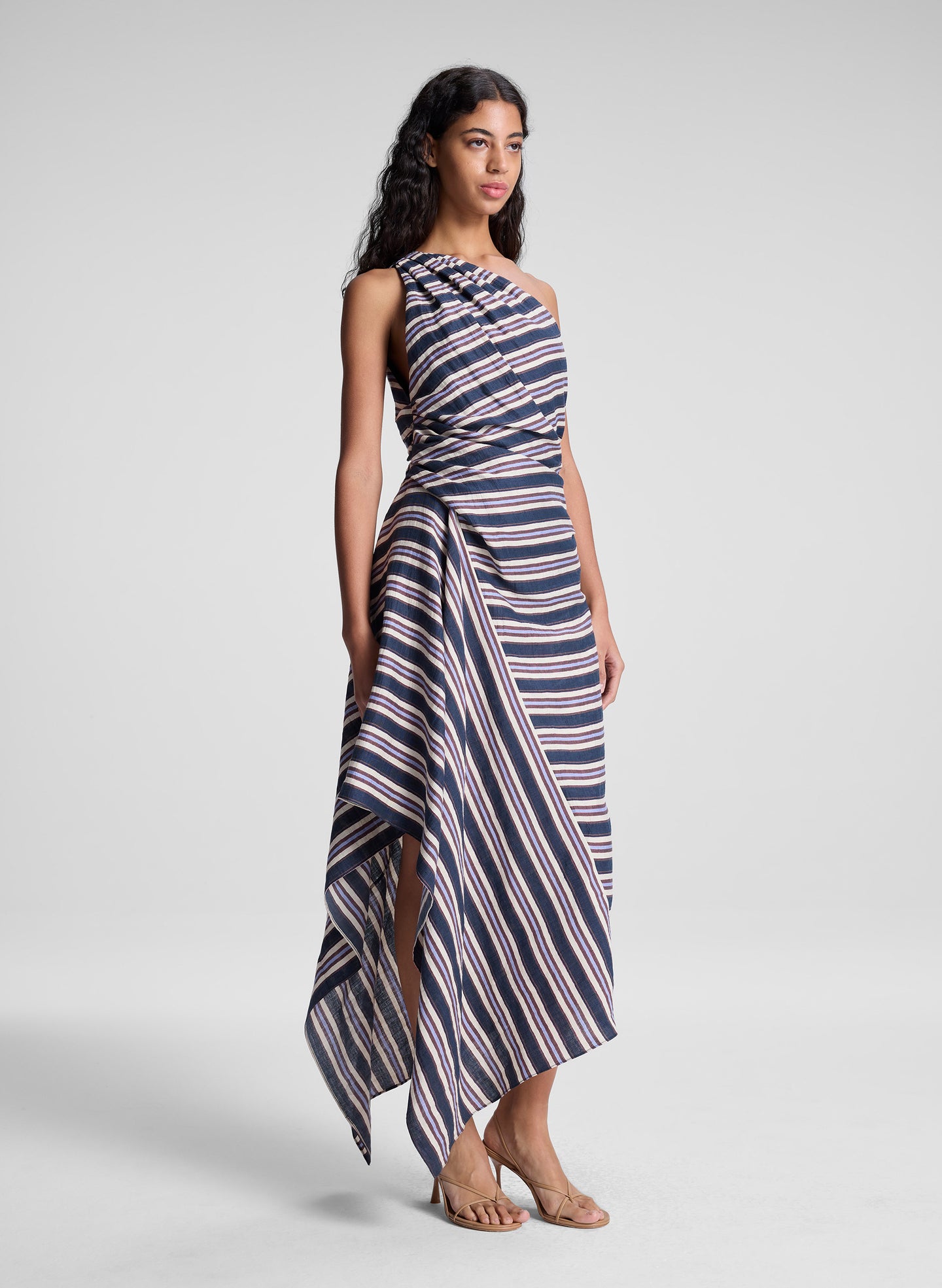 woman wearing navy blue striped midi dress