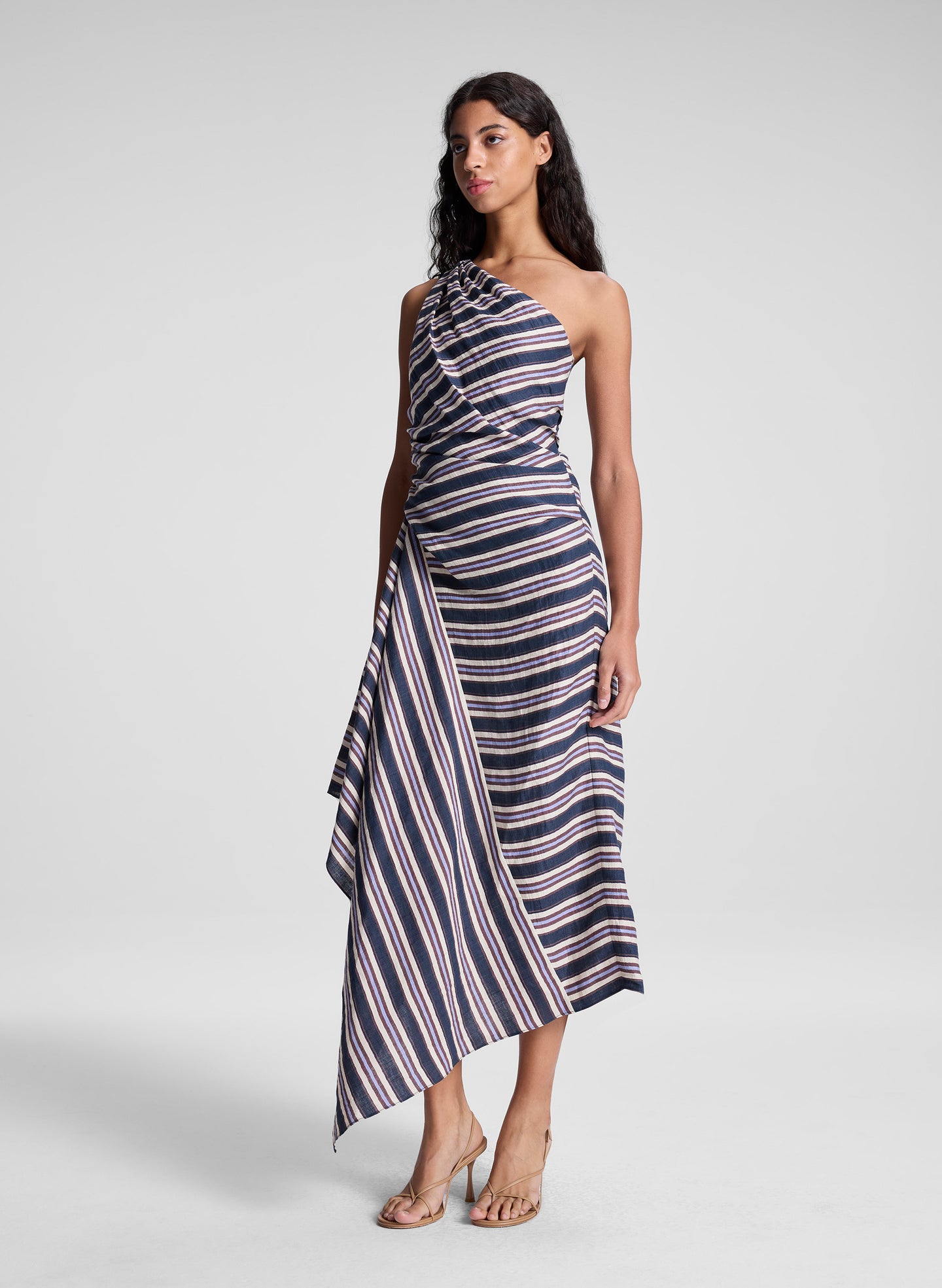 woman wearing navy blue striped midi dress