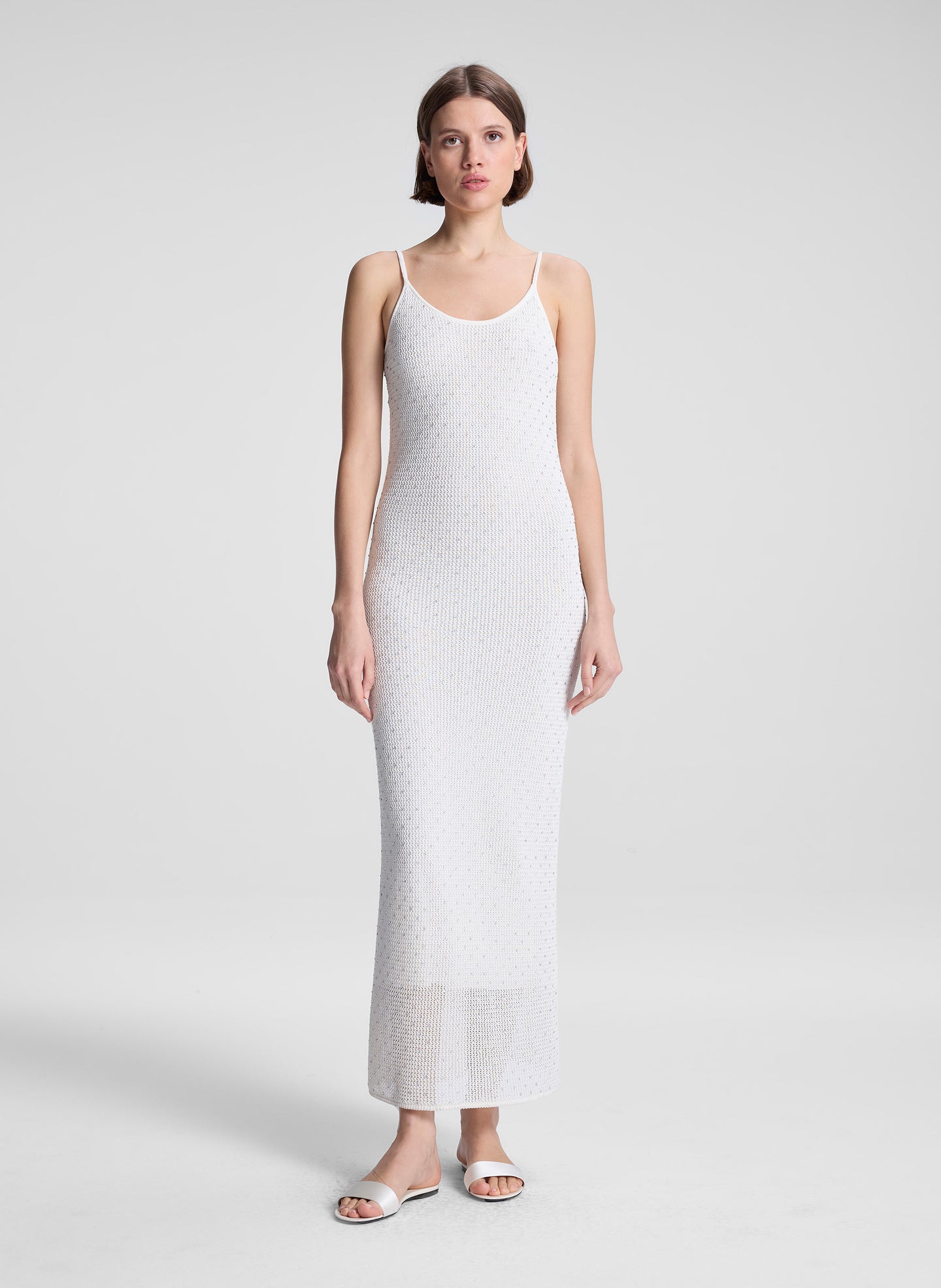 woman wearing white maxi dress