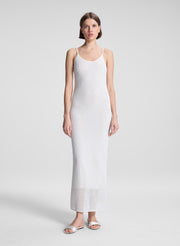 woman wearing white maxi dress